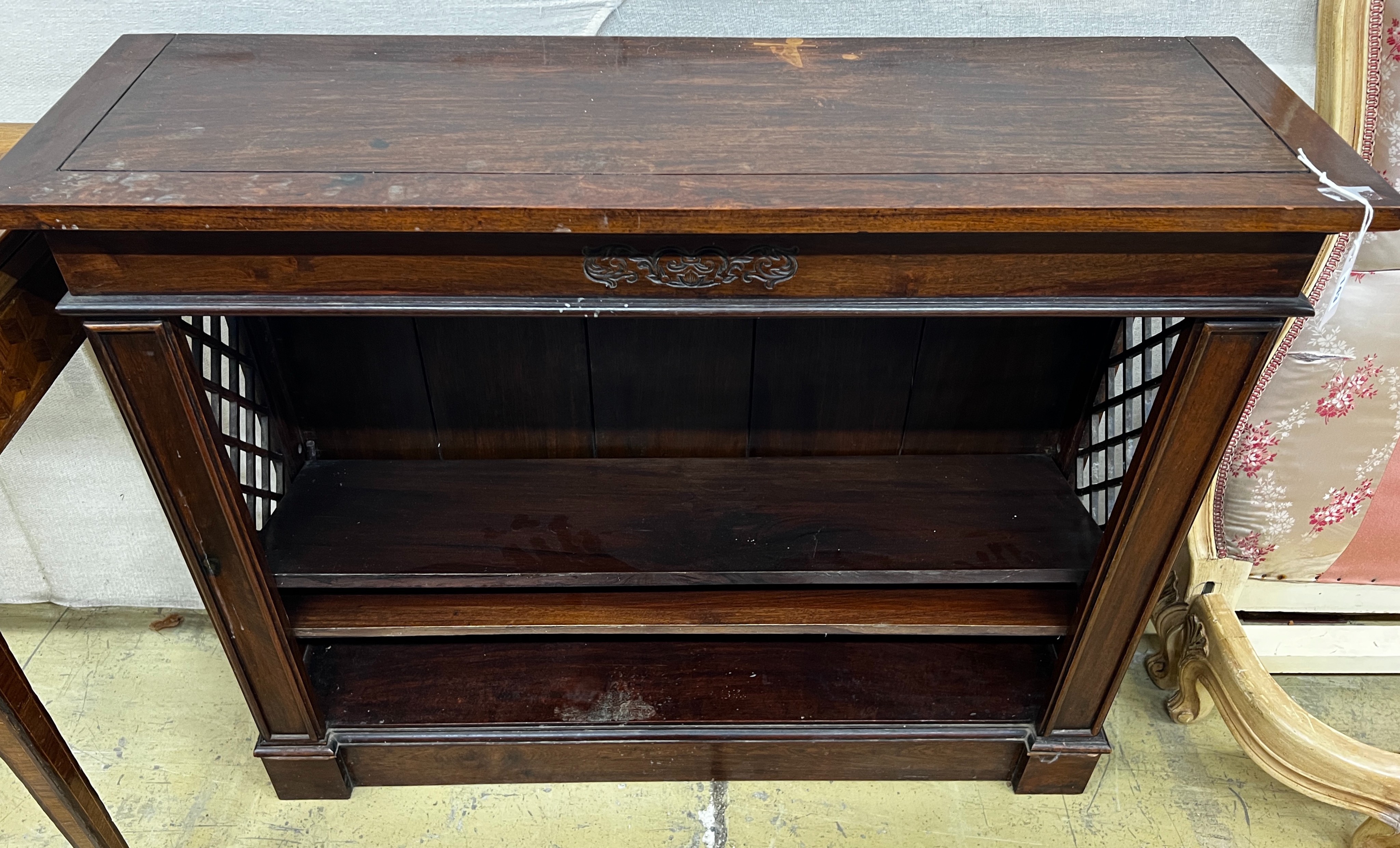 A reproduction hardwood dwarf open bookcase, width 107cm, depth 33cm, height 85cm